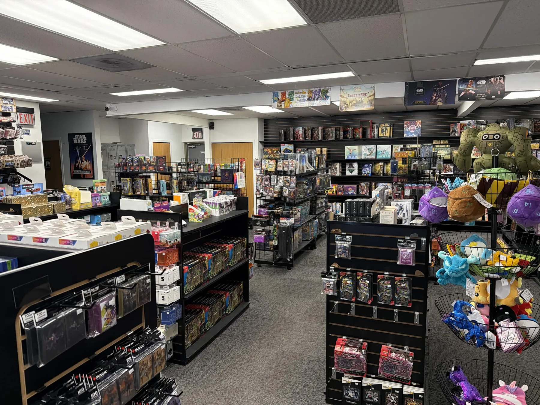 Rows of games, cards, and collectables inside Jester's Gallery